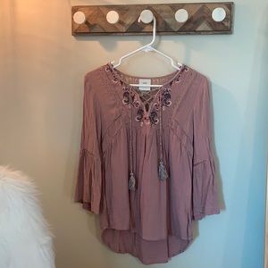 Size small flowy blouse.